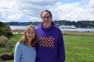 Doug & Karen Forsyth together smiling at a waterfront