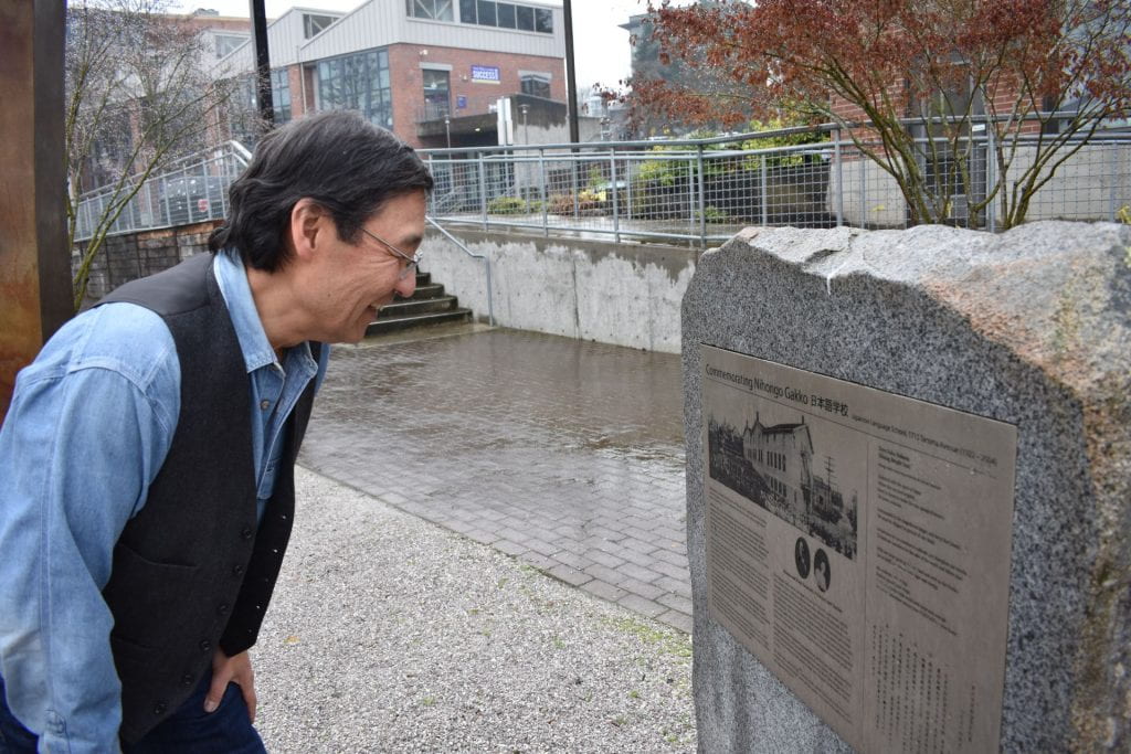 Greg Tanbara looking at the Japanese Language School memorial.