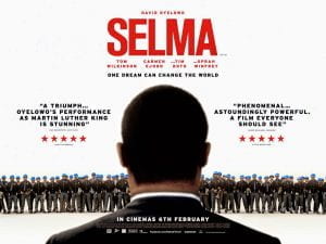 Selma poster: MLK faces a row of police