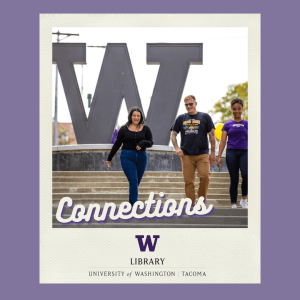 Students walking in front of the UW sign at UW Tacoma. 