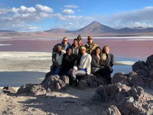 Adrianna posing with a group at the Salt flats 